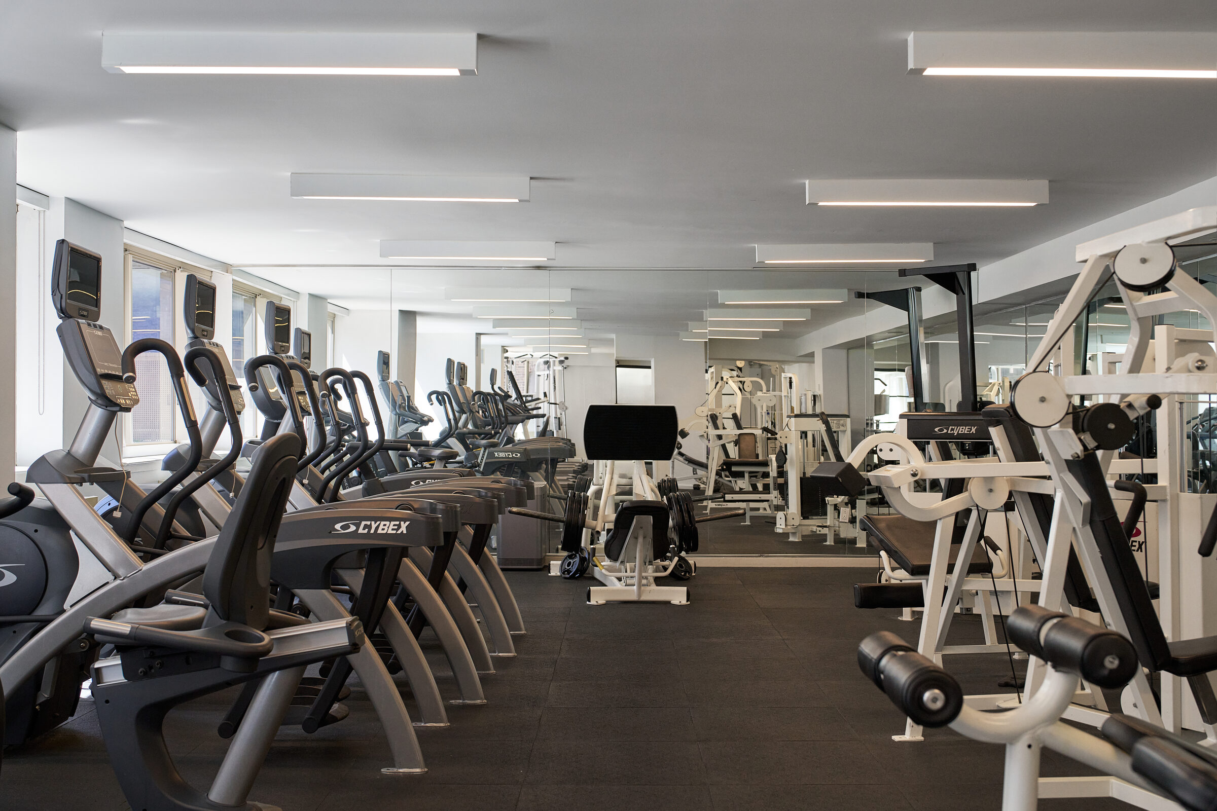 Fitness center at Atlas New York with cardio and strength equipment