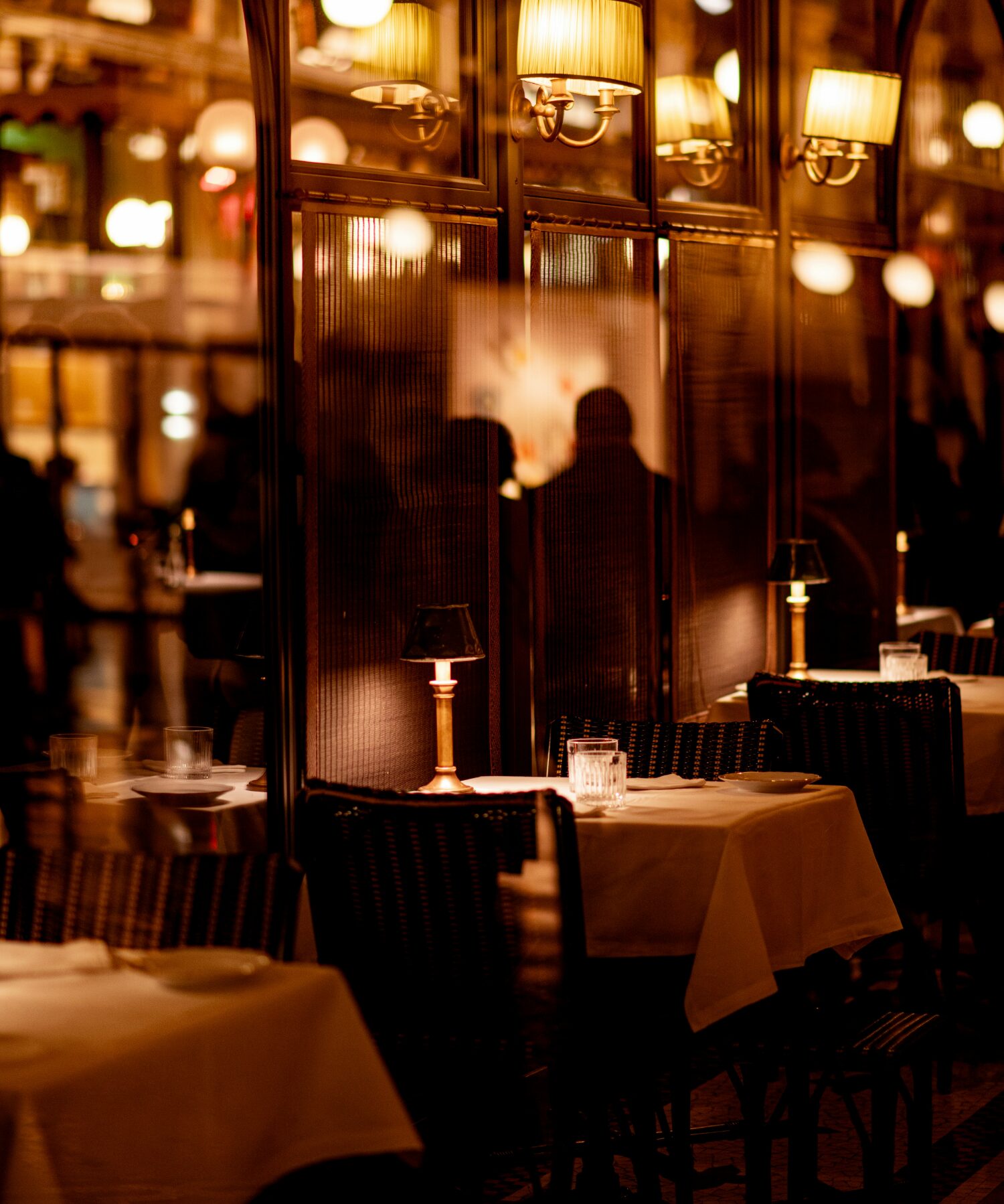 Dimly lit New York restaurant dining room