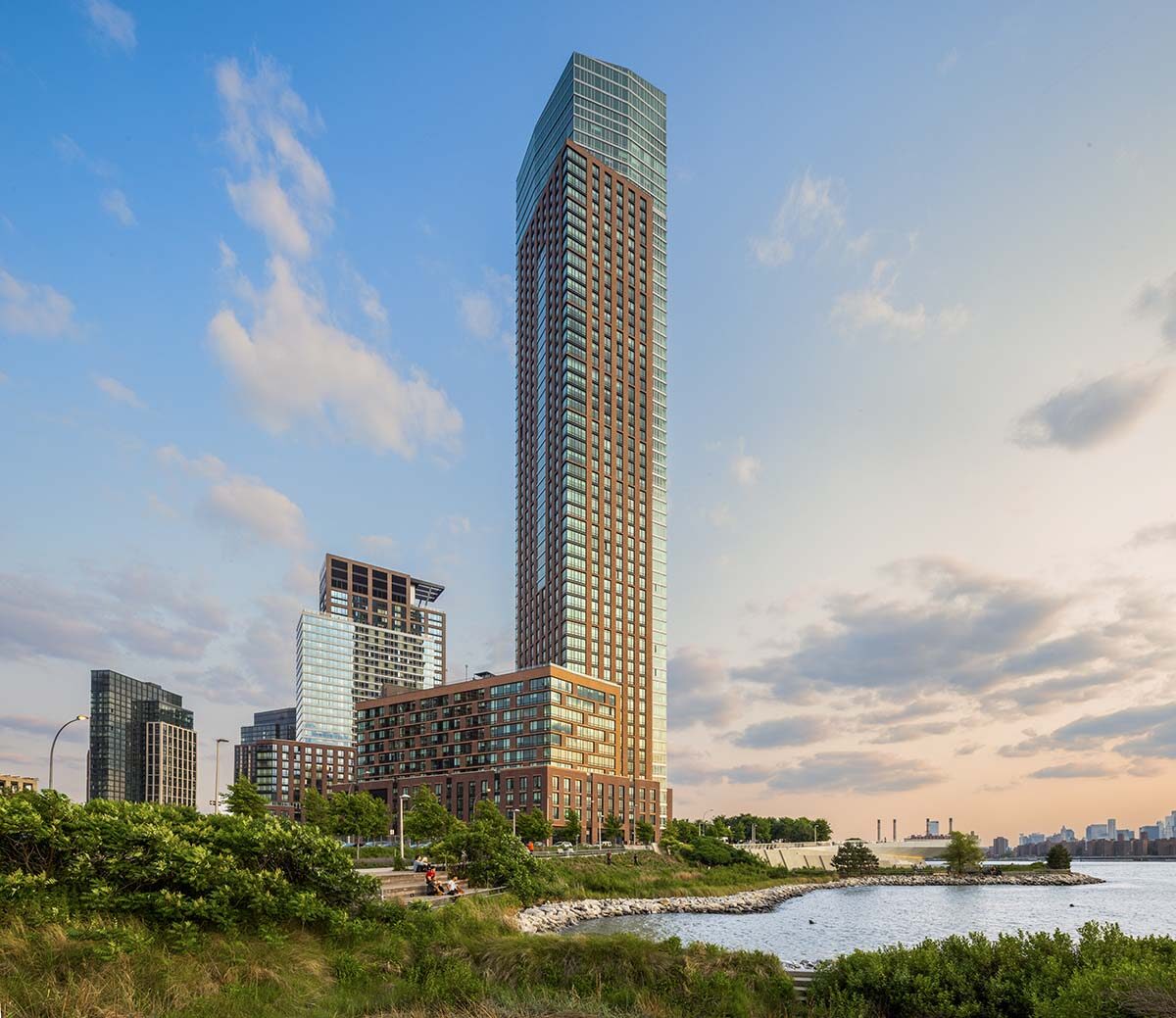 Gotham Point residential tower on the Long Island City waterfront at sunset