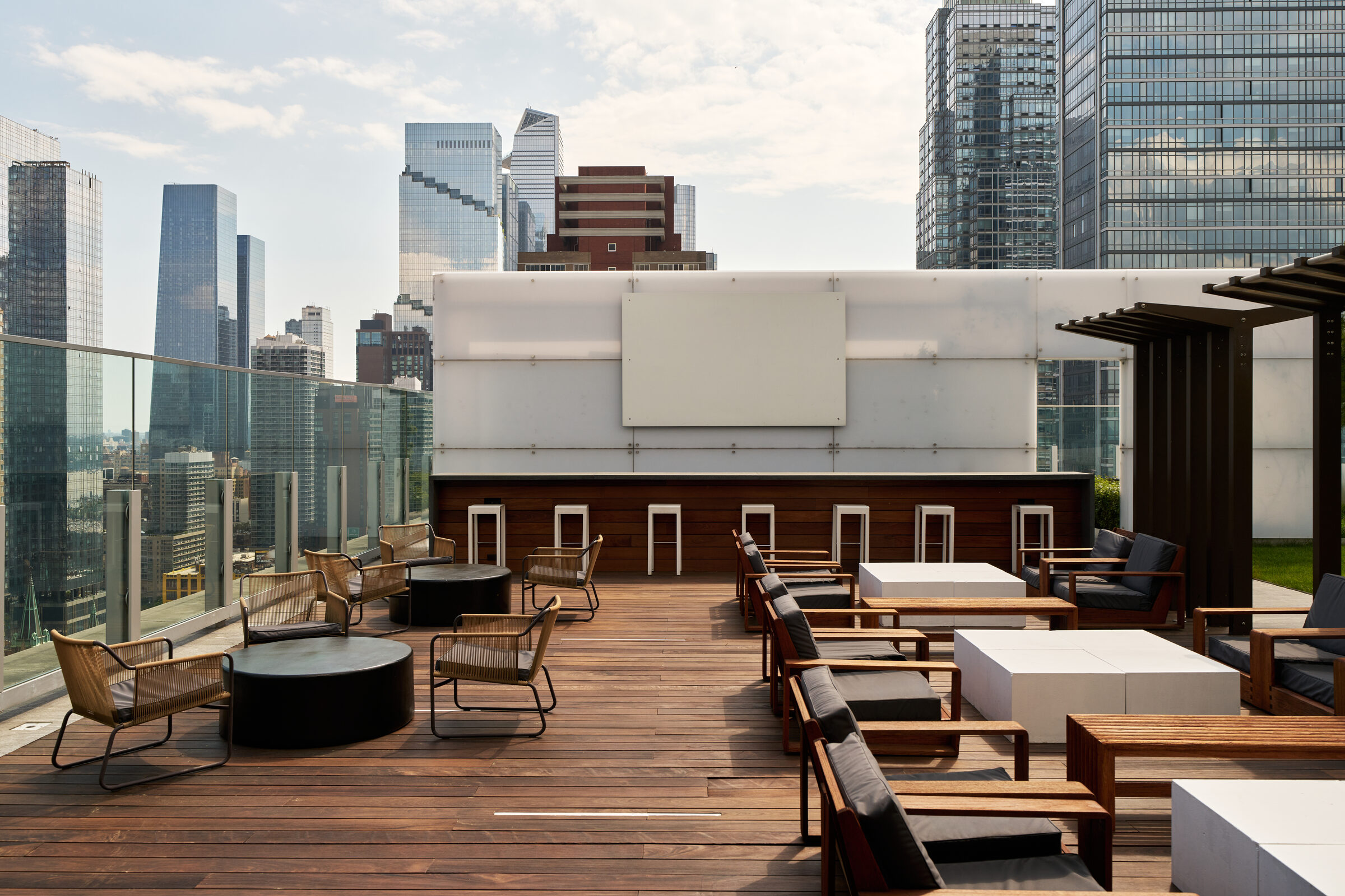 Furnished rooftop terrace at Gotham West with city views