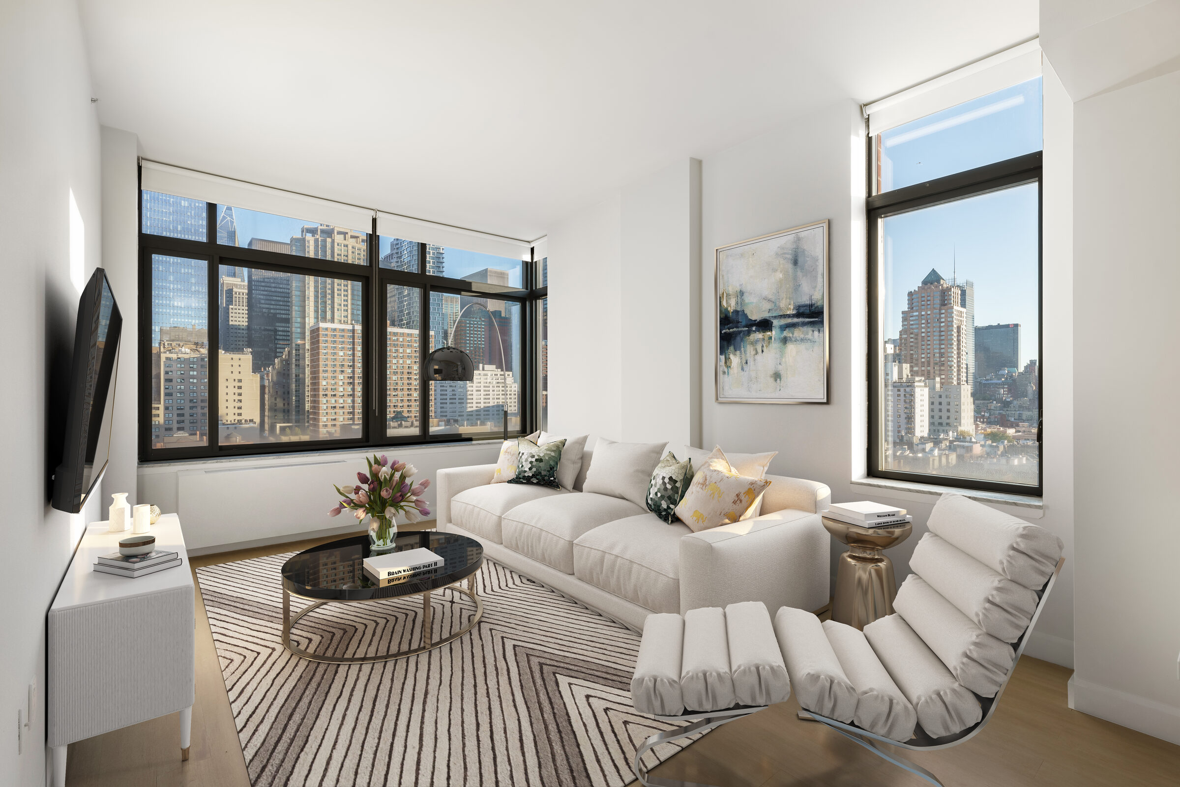 Sunlit living room at The Nicole with large windows and city views