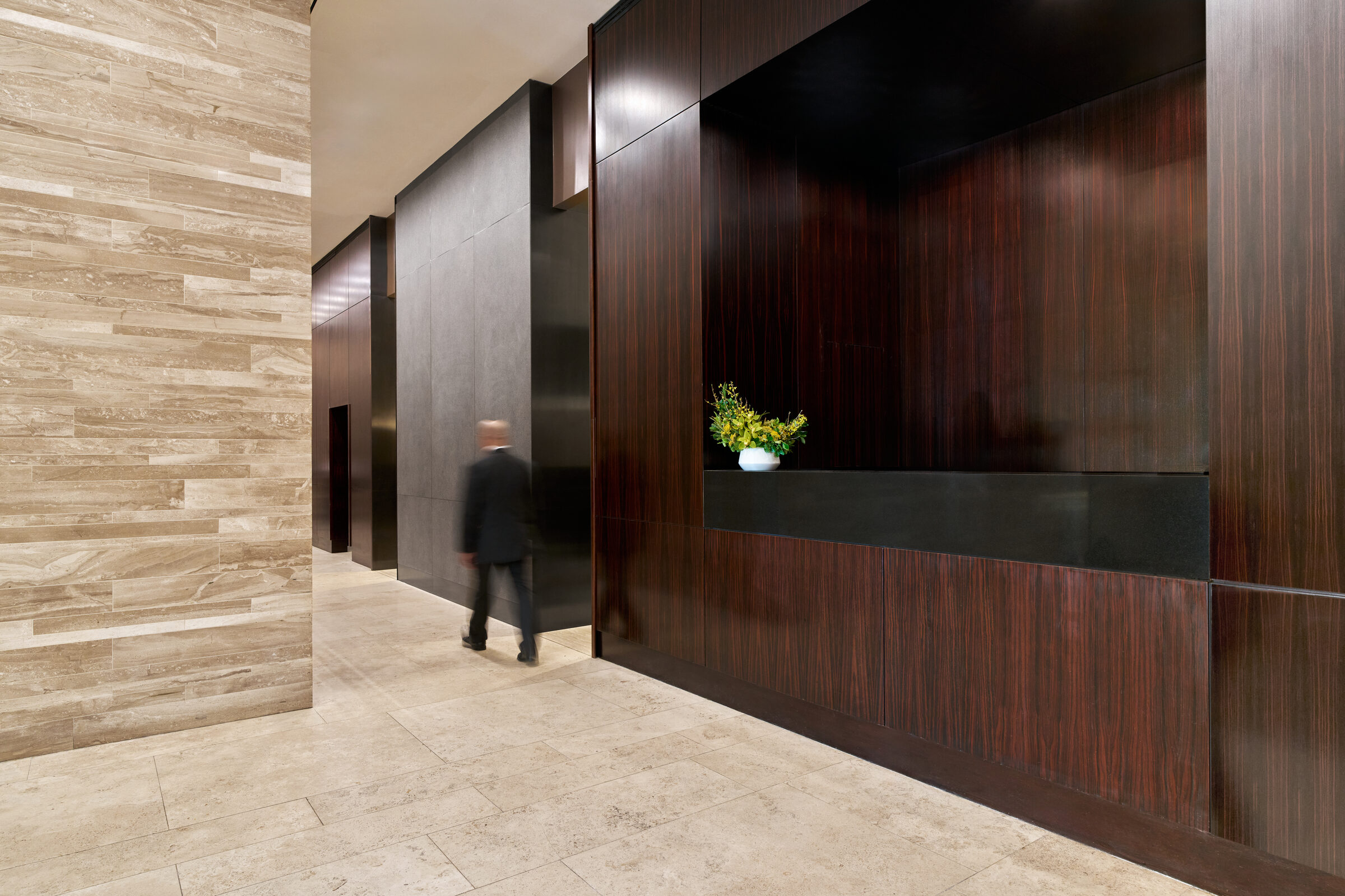 Wood-paneled reception lobby at The Nicole
